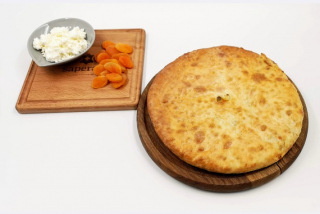 Ossetian pie with apricot, peach and curd