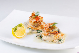 Fillet with shrimp and spinach sauce white fish