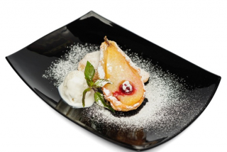   Pear baked in pasty with ice-cream