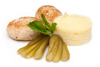 Chicken cutlet with mashed potatoes and pickles