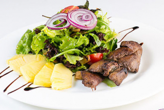 Salad with chicken liver and pineapple